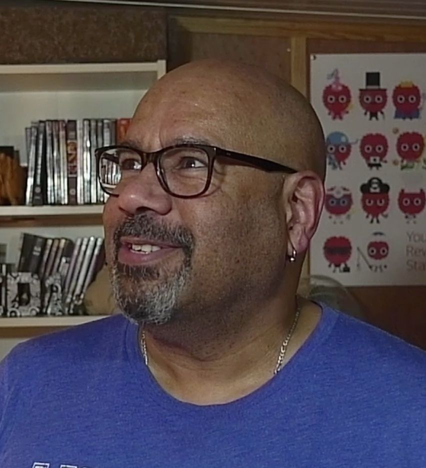 Mike Little, looking upwards, thoughtfully.