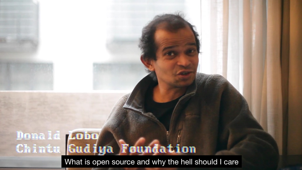 Donald Lobo, Chintu Gudiya Foundation being interviewed - subtitle caption says 'What is open source and why the hell should I car'?