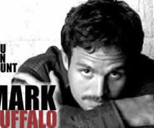 Photo of a 31 year-old Mark Ruffalo, with moustache, and his name overlayed.