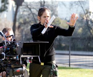 Director Lexi Alexander, behind a camera.