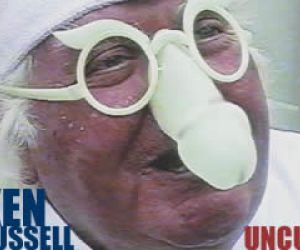 Ken Rusell with plastic spectacles featuring a penis
